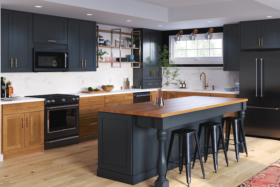 Transitional kitchen pairing a honey-toned wood base run with deep navy uppers and a navy furniture-style island on turned legs with a thick wood-toned top